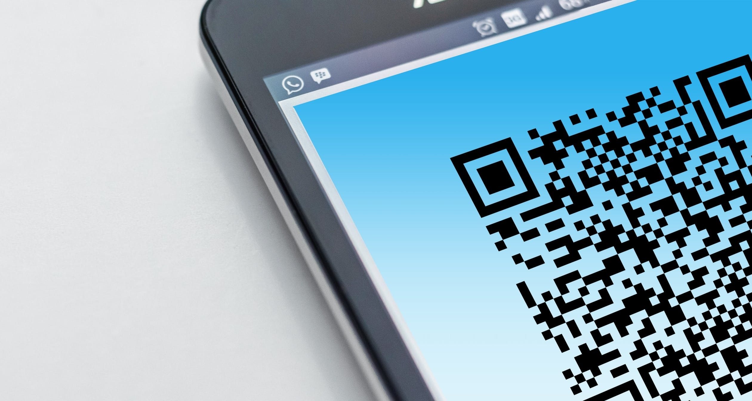 Customer using a QR code to learn about a small business